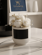 une bougie bouquet de fleurs éternel. Enlevé les tiges des fleurs, allumé la bougie, le message caché apparaîtra.